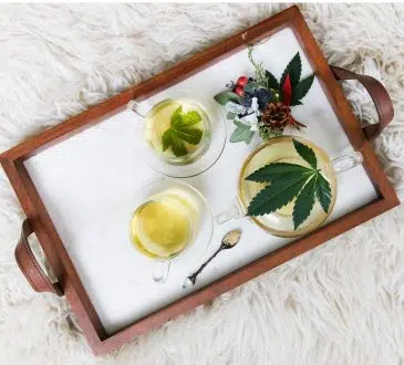 rectangular brown wooden tray filled with tea